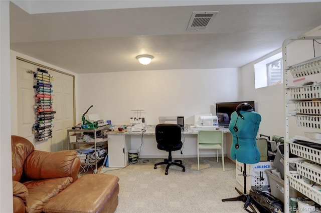 carpeted office space featuring visible vents