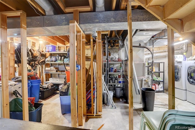 unfinished basement with separate washer and dryer