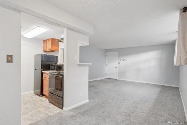 kitchen with light carpet, a textured ceiling, and black appliances