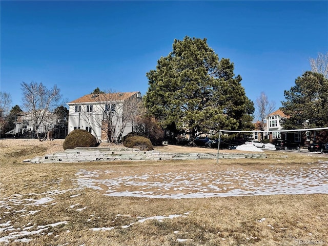 view of yard featuring volleyball court