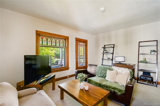 living room with light colored carpet