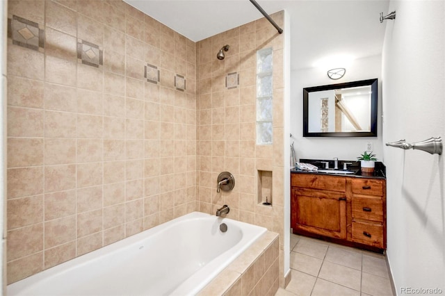 bathroom featuring tile patterned flooring, shower / bathing tub combination, and vanity