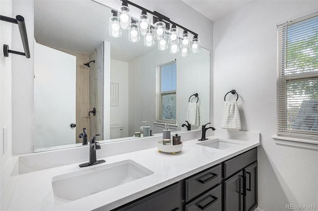 5068 E Crestone Ave, Castle Rock, CO 80104 - full bath featuring toilet, double vanity, and a shower
