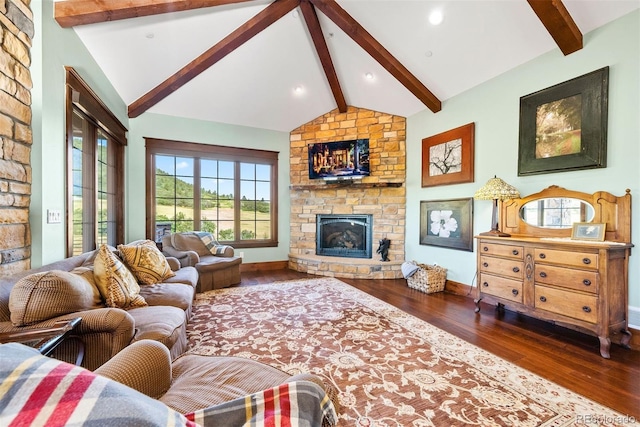 2480 Castle Butte Dr, Castle Rock, CO 80109 - living room featuring a stone fireplace, lofted ceiling with beams, baseboards, and wood finished floors