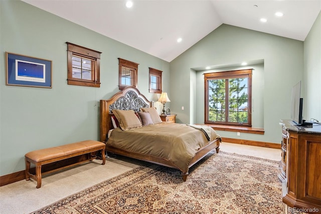 2480 Castle Butte Dr, Castle Rock, CO 80109 - bedroom featuring multiple windows, light colored carpet, and vaulted ceiling