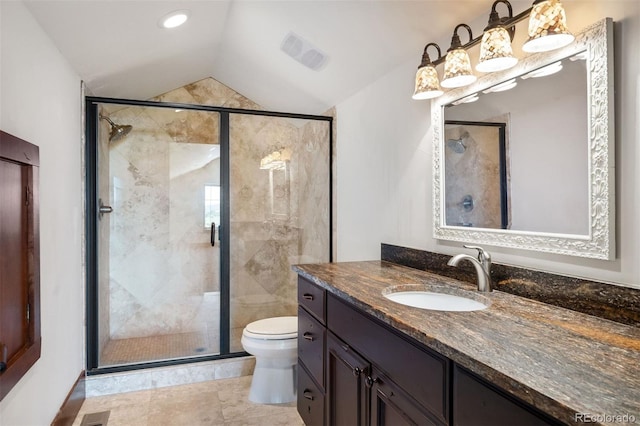 2480 Castle Butte Dr, Castle Rock, CO 80109 - full bath featuring vanity, visible vents, a stall shower, vaulted ceiling, and toilet