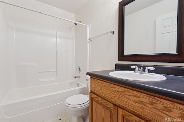 bathroom featuring toilet, tub / shower combination, and vanity