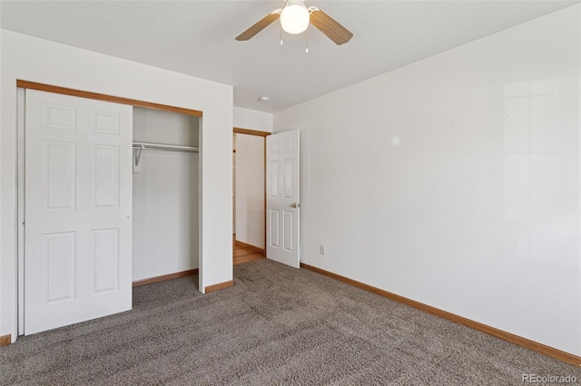 unfurnished bedroom featuring a closet, carpet flooring, ceiling fan, and baseboards