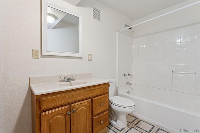 full bathroom with visible vents, shower / tub combination, vanity, and toilet