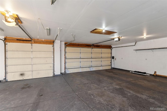 garage featuring a garage door opener