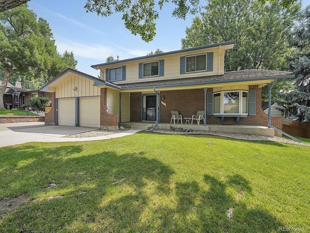 traditional-style house with a garage, driveway, a porch, and brick siding