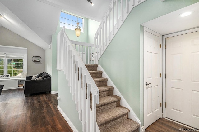 13118 Ash St, Thornton, CO 80241 - staircase with wood finished floors and vaulted ceiling