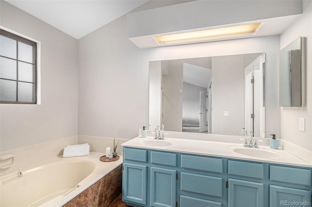 13118 Ash St, Thornton, CO 80241 - bathroom featuring double vanity and a garden tub