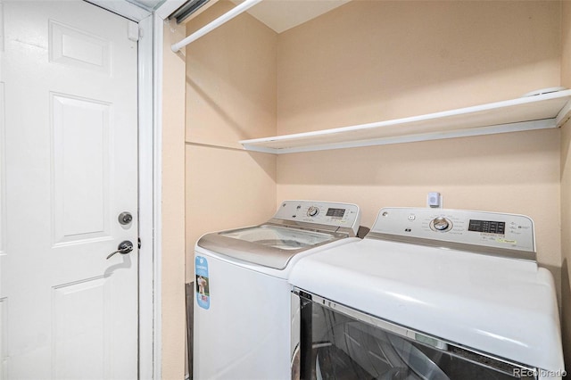 13118 Ash St, Thornton, CO 80241 - laundry area with washer and clothes dryer
