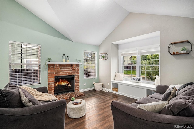 13118 Ash St, Thornton, CO 80241 - living room with a brick fireplace, wood finished floors, and high vaulted ceiling