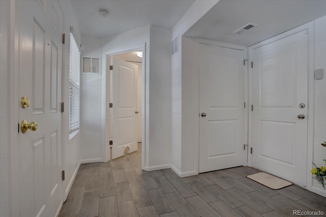 9520 Halstead, Lone Tree, CO 80124 - hallway with baseboards and wood finished floors