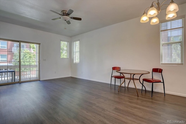 9520 Halstead, Lone Tree, CO 80124 - dining room with dark wood-style flooring, ceiling fan, a chandelier, and baseboards