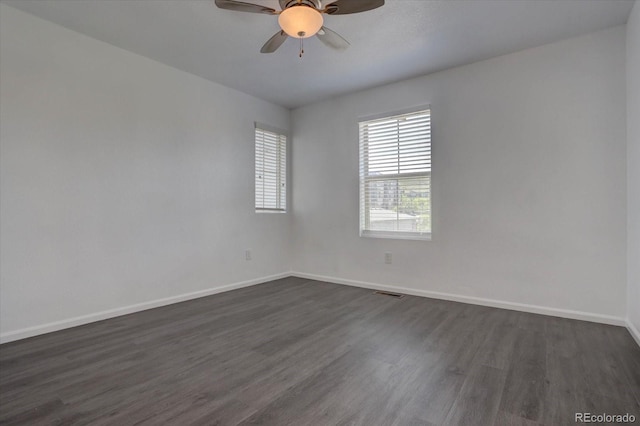 9520 Halstead, Lone Tree, CO 80124 - empty room with dark wood-style flooring, baseboards, and ceiling fan