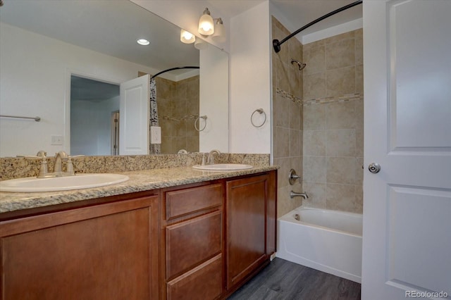 9520 Halstead, Lone Tree, CO 80124 - bathroom with shower / bath combination, wood finished floors, and double vanity