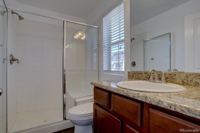 9520 Halstead, Lone Tree, CO 80124 - bathroom featuring a shower stall, toilet, and vanity