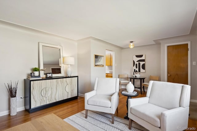 sitting room featuring hardwood / wood-style flooring