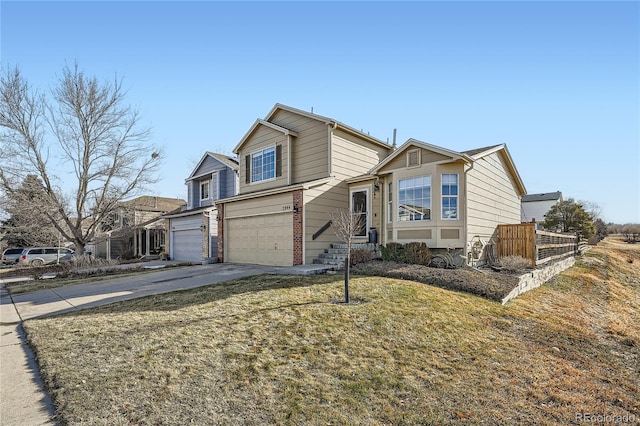 view of front facade featuring a garage and a front yard