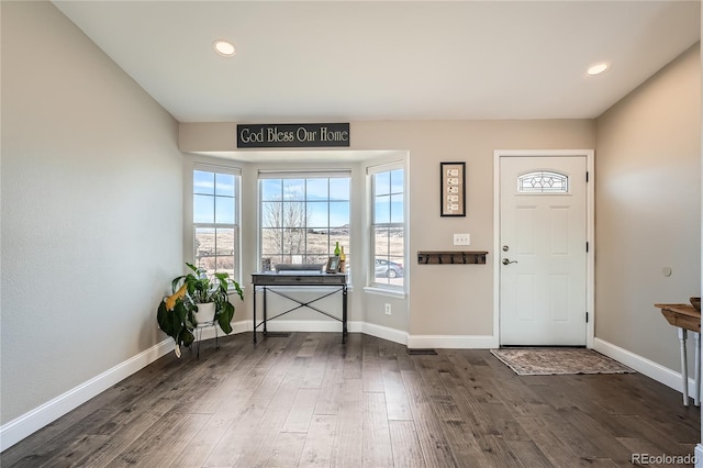 entrance foyer featuring dark hardwood / wood-style flooring