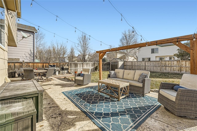 view of patio with an outdoor hangout area and a storage unit