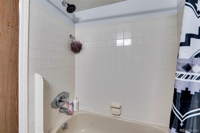 full bathroom with shower / bath combo