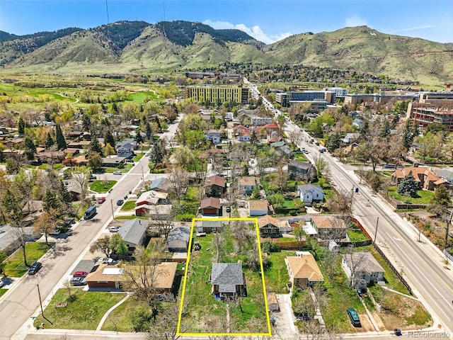 1914 Washington Ave, Golden, CO 80401 - aerial view of residential area with property boundaries highlighted and a mountain backdrop