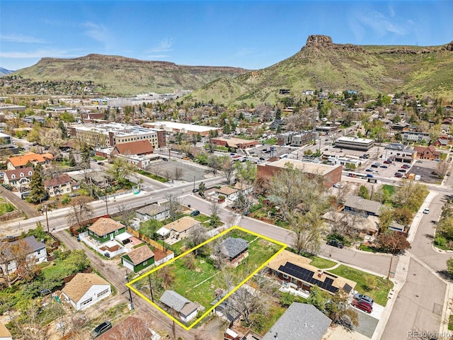 1914 Washington Ave, Golden, CO 80401 - aerial perspective of suburban area with property parcel outlined and a mountainous background