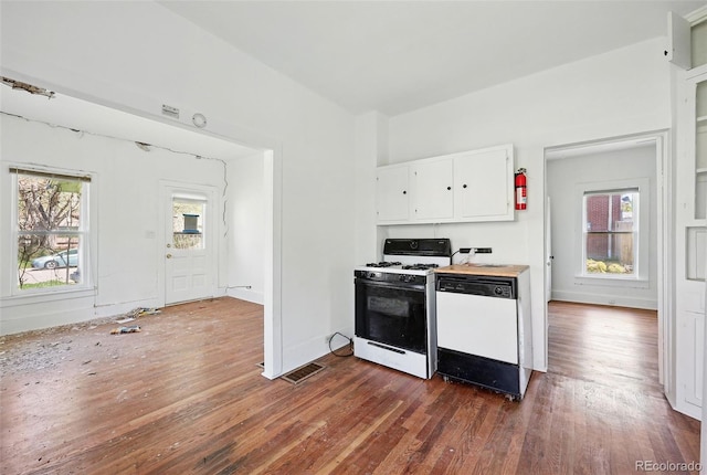 1914 Washington Ave, Golden, CO 80401 - kitchen featuring white appliances, dark wood-style flooring, white cabinetry, and light countertops