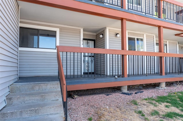 wooden deck featuring covered porch