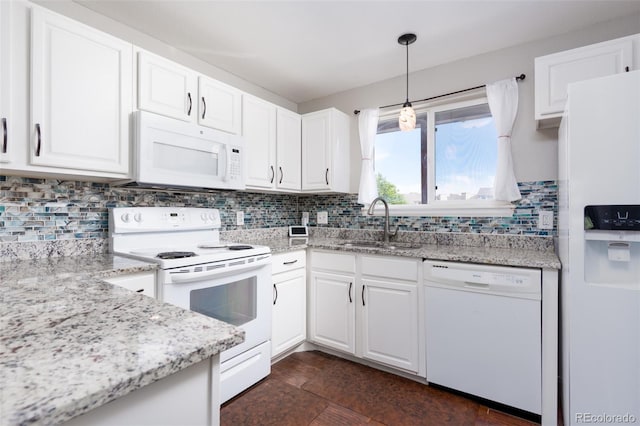 kitchen featuring white cabinetry, a sink, and white appliances