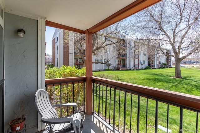balcony featuring a residential view
