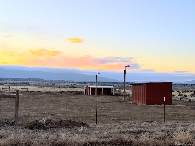 exterior space with a rural view