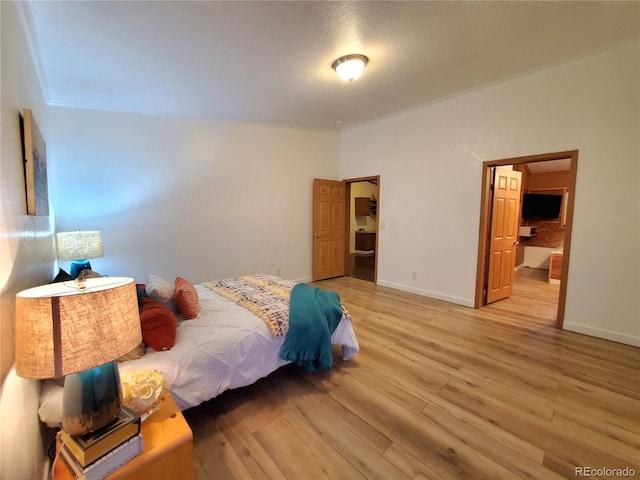 bedroom with light hardwood / wood-style floors