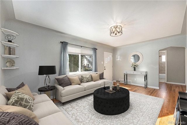 living room with hardwood / wood-style flooring