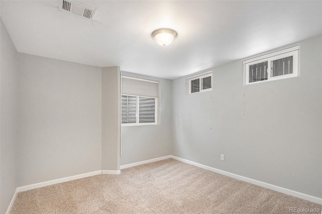 empty room featuring carpet floors