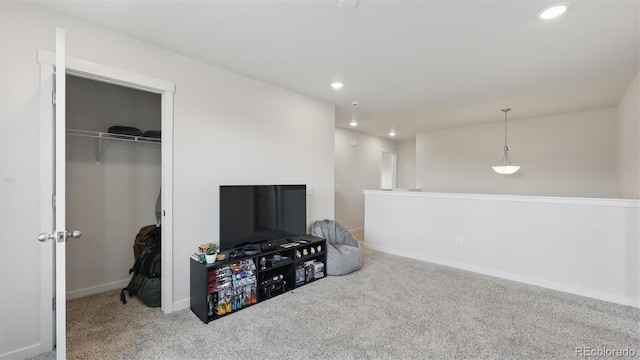 interior space with baseboards and recessed lighting