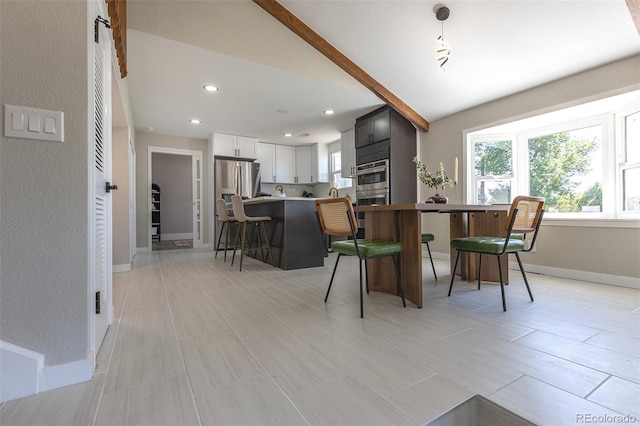 5195 Allison St, Arvada, CO 80002 - dining room featuring lofted ceiling and recessed lighting