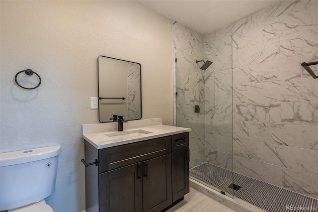 5195 Allison St, Arvada, CO 80002 - bathroom with a tile shower and vanity
