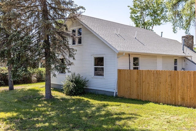 5195 Allison St, Arvada, CO 80002 - view of side of property featuring roof with shingles