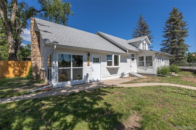 5195 Allison St, Arvada, CO 80002 - back of house featuring roof with shingles