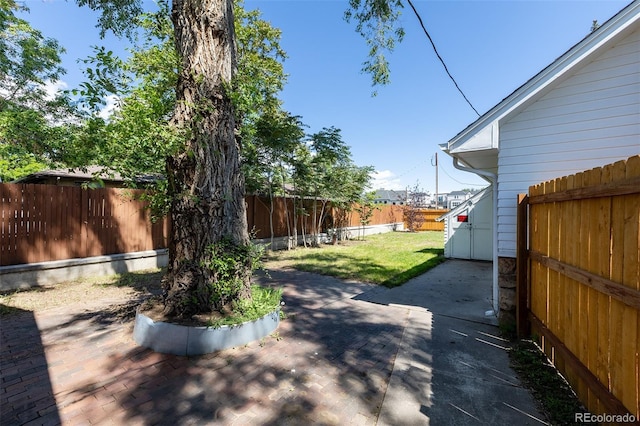 5195 Allison St, Arvada, CO 80002 - fenced backyard featuring a patio
