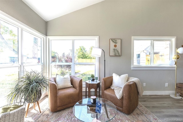 5195 Allison St, Arvada, CO 80002 - sitting room featuring lofted ceiling and wood finished floors