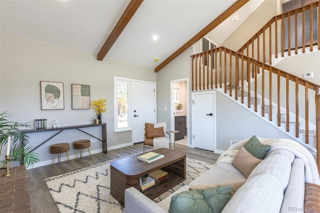 5195 Allison St, Arvada, CO 80002 - living area featuring stairs, beamed ceiling, wood finished floors, high vaulted ceiling, and recessed lighting