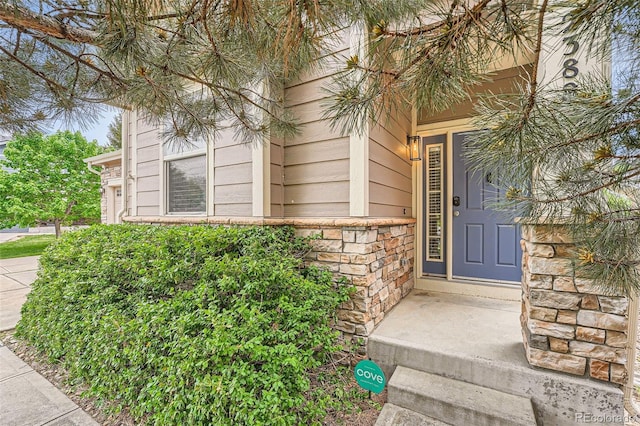 23882 E Alabama Dr, Aurora, CO 80018 - property entrance with stone siding
