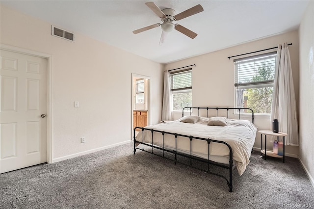 23882 E Alabama Dr, Aurora, CO 80018 - bedroom with carpet, baseboards, and a ceiling fan