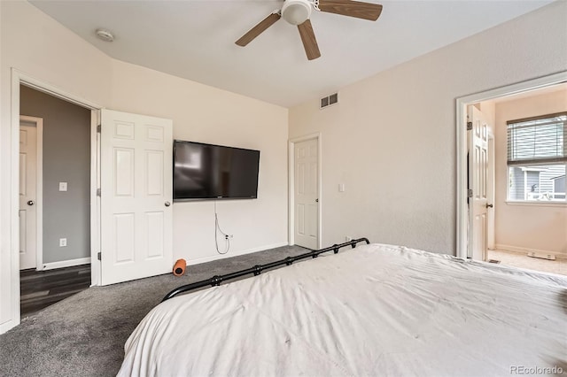 23882 E Alabama Dr, Aurora, CO 80018 - carpeted bedroom with baseboards and ceiling fan